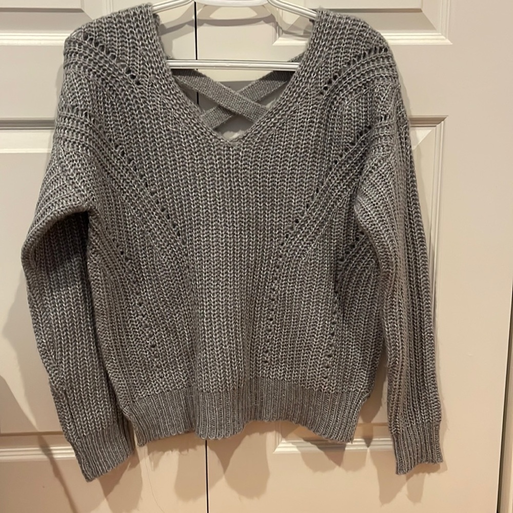 grey sweater with cross back